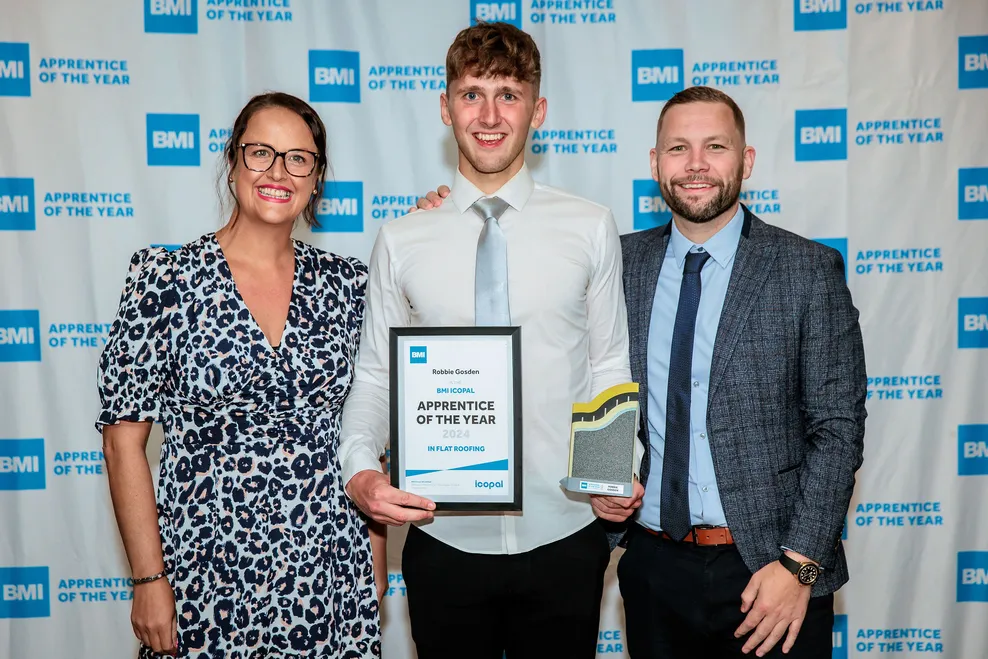 Robbie Gosden, winner of BMI Apprentice of the Year, with Kelly Taylor & Jamie Taylor of Taylor Roofs