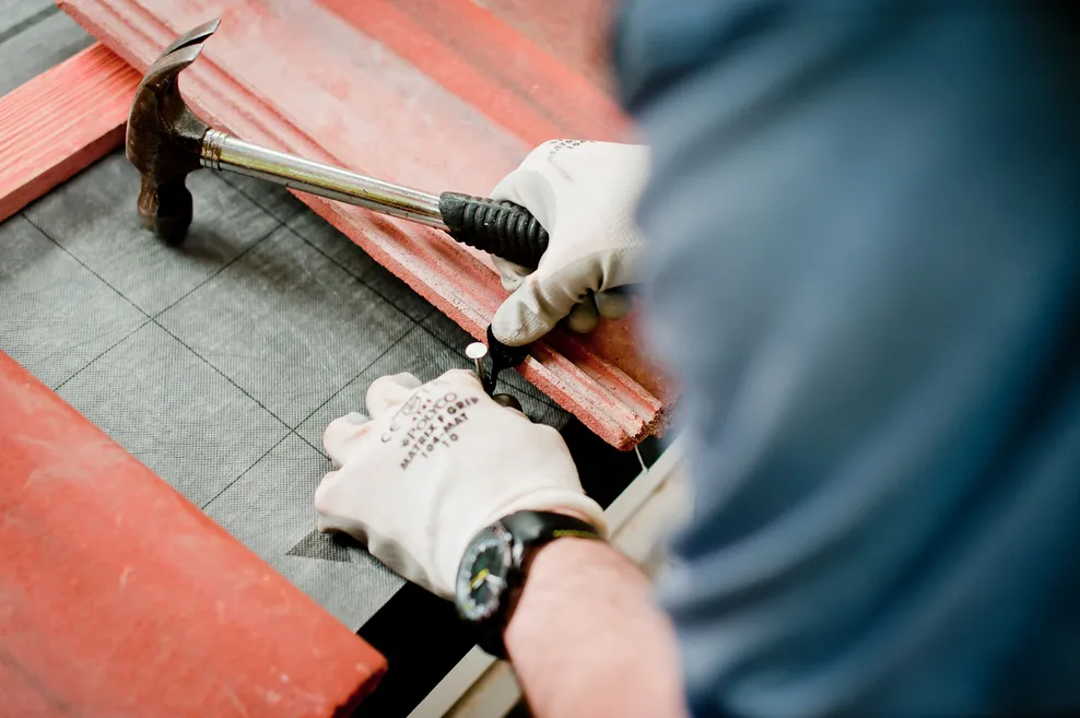 Clipping and nailing a roof tile for fixing specification